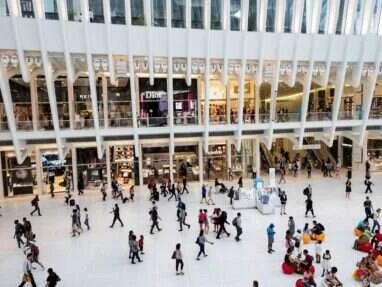 Visitors walking inside a shopping mall - people counting foot traffic analytics