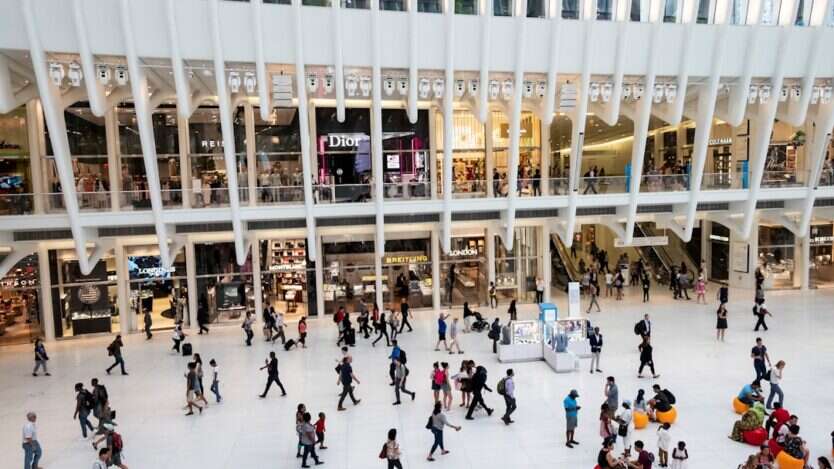 Visitors walking inside a shopping mall - people counting foot traffic analytics