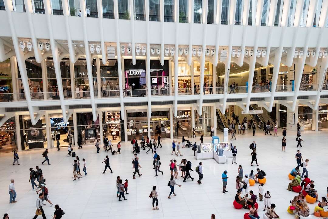 Visitors walking inside a shopping mall - people counting foot traffic analytics