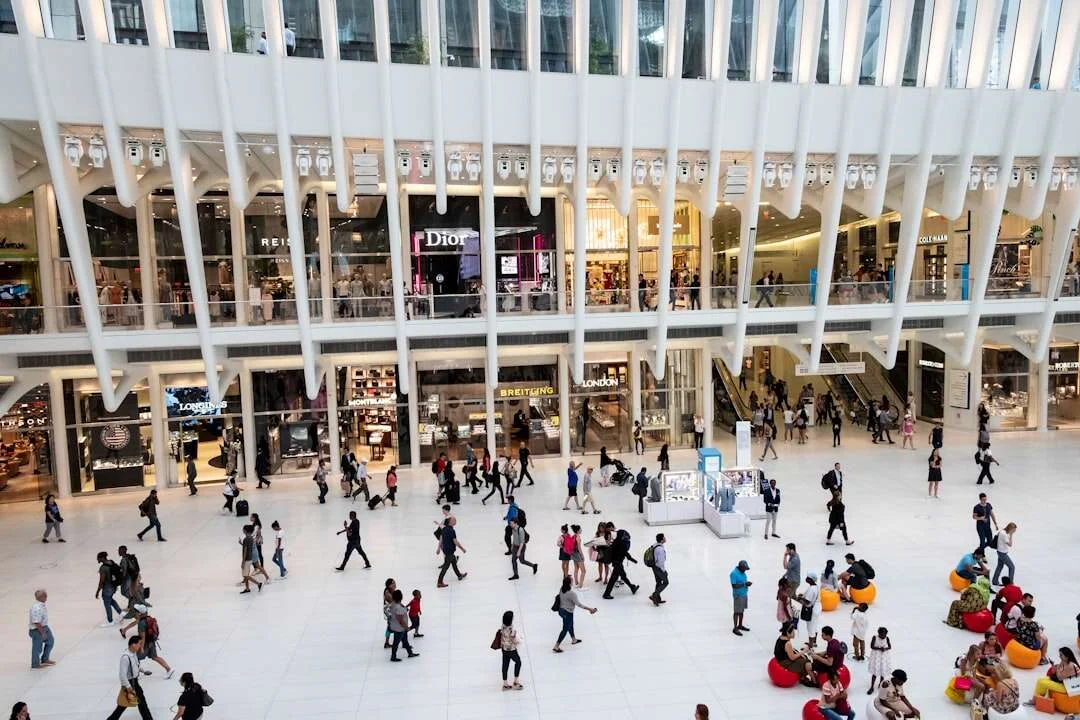 Visitors walking inside a shopping mall - people counting foot traffic analytics